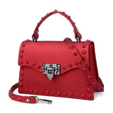 Die mit Nieten besetzte Handtasche „Torino“ – mehrere Farben